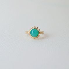 This enchanting beauty of our Nova ring features an eye-catching chrysoprase. Hand-carved and delicately designed, this 14k yellow gold ring from our Nova collection will add a touch of dreamy elegance to any outfit. Treat yourself or a loved one to this captivating piece. -hand-carved ring in 14k gold -natural chrysoprase -signature brushed finish -The ring is made in size 6.5. Resizing available upon request Nova Ring, Hand Carved Ring, Carved Ring, Yellow Gold Ring, Yellow Gold Rings, Treat Yourself, Gold Ring, Hand Carved, Gold Rings