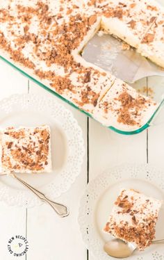 a piece of cake sitting on top of a white plate next to two plates with desserts