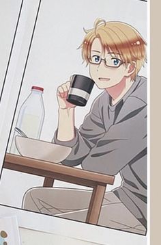 a person sitting at a table with a cup in their hand and an anime character holding a coffee mug