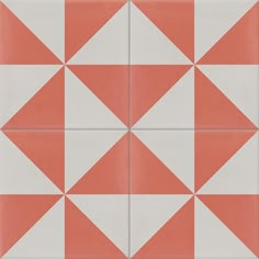 an orange and white tile pattern with triangles