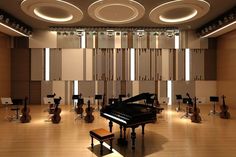 an empty concert hall with musical instruments and lights