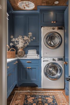 a washer and dryer in a blue laundry room