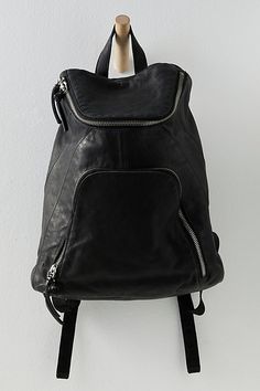 Take heavy carrying to the next level with this edgy, minimalist leather backpack. **Features:** Backpack style, bucket design, leather fabrication, exterior zipper pocket, zipper closure, interior zipper pocket, adjustable shoulder straps, top handle **Why We | Seraphina Leather Backpack Bag by FP Collection at Free People in Black Outfits With Purses, Edgy Minimalist, Jay Chou, Bucket Design, Chic Backpack, Statement Handbag, Gothic Chic, Backpack Outfit, Backpack Free