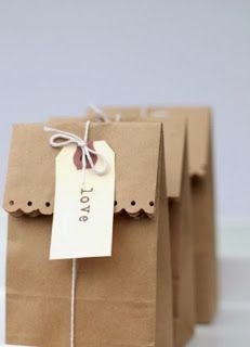 small brown paper bags with tags on them