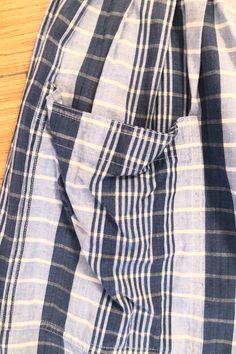 Vintage Calvin Klein Plaid Skirt. Blue plaid knee-length skirt with side button placket and patch pocket. 100% Cotton, hand wash cold. No marked size fits XS/S. Approx Measurements Waist: 13" Length: 28" Casual Plaid Bottoms With Button Closure, Cotton Skirt With Pockets For Daywear, Plaid Cotton Shorts For Daywear, Plaid Cotton Relaxed Skirt, Blue Knee-length Bottoms With Button Closure, Plaid Cotton Skirt For Work, Gingham Bottoms With Pockets, Gingham Bottoms With Pockets In Short Shape, Gingham Short Bottoms With Pockets