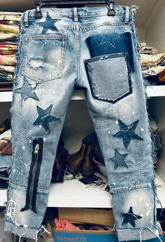 jeans with stars and zippers are on display