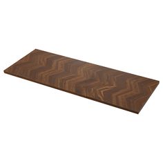 a wooden cutting board with chevron design