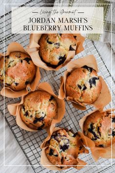 blueberry muffins on a cooling rack with text overlay that reads, using the power of jordan marsh's blueberry muffins