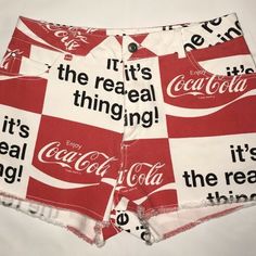 Coca Cola Shorts Red & White Logo Vacation Graphic Print Short Bottoms, Graphic Print Shorts For Beach Season, Cotton Shorts With Letter Print For Beach Season, Beach Graphic Print Cotton Bottoms, White Graphic Print Beach Bottoms, Beach Cotton Bottoms With Graphic Print, Graphic Print Cotton Beach Bottoms, White Letter Print Shorts For Beach, White Letter Print Shorts For The Beach