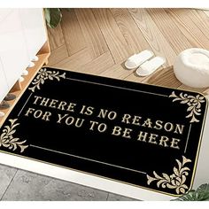 there is no reason for you to be here door mat in black and gold color