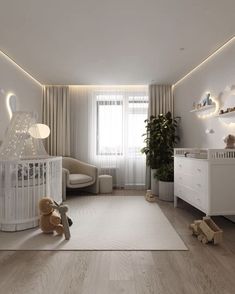 a baby's room is decorated in white and neutral colors with lights on the ceiling