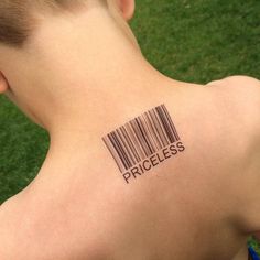 the back of a person's neck with a barcode tattooed on it that says, priceless