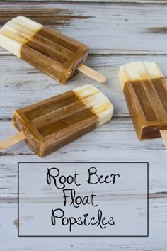 three popsicles with root beer float on them