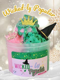 a bucket filled with green and pink ice cream next to a snowflakes background