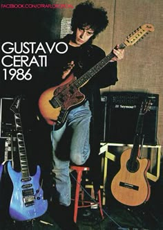 an image of a man playing guitar in the studio