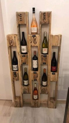 a wine rack made out of wooden pallets