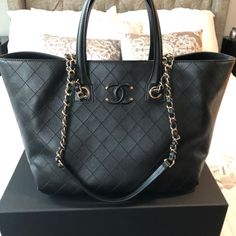 Large Chanel Shopping Bag In Great Condition. High-end Tote Bag With Branded Hardware, High-end Black Bags With Branded Hardware, High-end Luxury Tote Bag, Designer Everyday Luxury Bag With Handles, Chic Tote Bag For Everyday Luxury, Chic Everyday Luxury Tote Bag, High-end Black Bag With Removable Pouch, Chic Bags With Double Handle For Everyday Luxury, High-end Everyday Luxury Tote Shoulder Bag