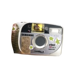 a digital camera is shown with an animal sticker on it