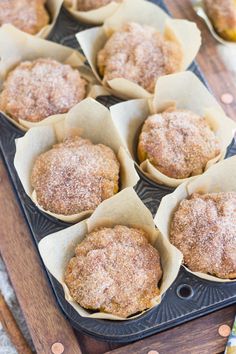 several muffins are sitting on a baking tray