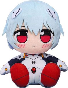 a stuffed animal with red eyes and blue hair sitting on top of a white surface