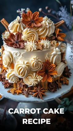 carrot cake with white frosting and flowers on top