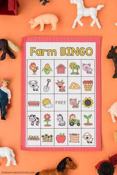 a farm bingo game surrounded by toy farm animals and toys on an orange background with the words farm bingo