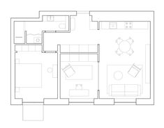 a floor plan for a living room and dining area with furniture in the center,