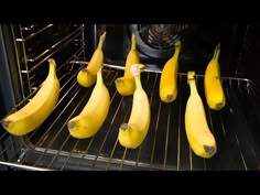 bunches of bananas are sitting in an oven