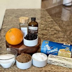 ingredients for an orange cake sitting on a counter