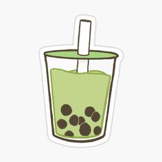 a green drink with a straw in it