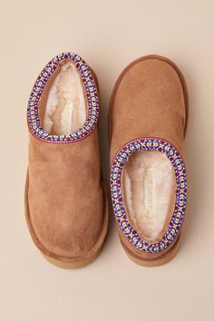 No one does cozy vibes better than the Madden Girl Elyse-W Tan Suede Embroidered Flatform Slippers! Soft faux suede forms these essential winter slippers with a rounded-toe upper that leads to a low-cut collar with trendy, multi-colored embroidered trim. The effortless slip-on silhouette is perfectly lined with fuzzy faux fur for maximum comfort. A lightweight, chunky flatform sole completes the coveted look! 1. 5" flatform sole. Cushioned insole. Rubber sole has nonskid markings. Man Made Materials. Imported. Lulus | Elyse-W Tan Suede Embroidered Flatform Slippers | Size 10. Winter Slippers, Embroidered Trim, Cozy Vibes, Tan Suede, Madden Girl, Low Cut, Multi Colored, Faux Suede, Rubber Sole