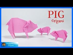 pink origami pigs are standing next to each other and the words pig orgi written in red