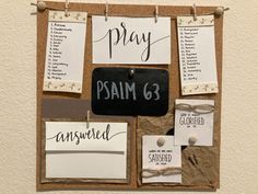 a bulletin board that has been decorated with paper and magnets to say, pray