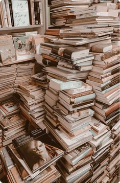 a pile of books stacked on top of each other