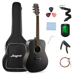 an acoustic guitar is shown with accessories