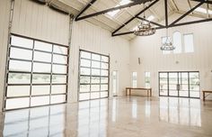 the inside of a large white building with windows