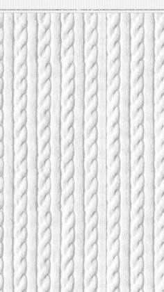 a white wallpaper with braiding on it