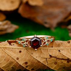 a ring that is sitting on top of a leaf