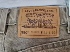 These are a great color! Vintage 1990s Levi Strauss 550 Relaxed Fit orange label greenish tan cotton denim pre-faded jeans! Tag men's 31x30, measured at 28x29, and made in USA. Brown label, paper inner tag is mint. Please see photos for condition on vintage denim but I can say these are really impressive condition wise! Please see our other listings for more vintage Levi Strauss garments with new items added nearly daily. Pete's Obsolete is smoke-free. We present garments as honestly as possible Faded Jeans, Label Paper, Color Vintage, Vintage Textiles, Levi Strauss, Vintage Wool, Vintage Levis, Vintage Denim, Quality Clothing