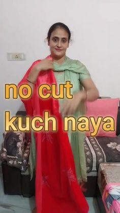 a woman wearing a red sari standing in front of a bed with the words no cut kuch nayya on it