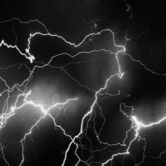 black and white photo of lightning in the sky