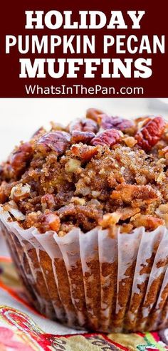 a close up of a muffin with pecans in it and the words holiday pumpkin pecan muffins