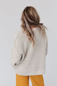 Snuggle up in a chunky boho sweater like the Crisp Air pullover. Thick, seam detailing and a fun double - hem has a bit of open - stitch detail at the notches in the sides. This modern, boxy - fit has wide cuffs and comfy Dolman - style sleeves. Pair with: Evermore Seamless Lace Racerback Bralette, Washed Ashore Ruffled Maxi Skirt and Dreamscape Layered Necklace. *Due to lighting and differences in monitors, actual colors may vary slightly from what appears online. Model is 5'8" and wearing a si Ruffled Maxi Skirt, Womens Boho Tops, Washed Ashore, Floral Cuff, Ruffle Maxi Skirt, Crisp Air, Boho Sweater, Wide Cuff, Long Sleeve Knit Tops