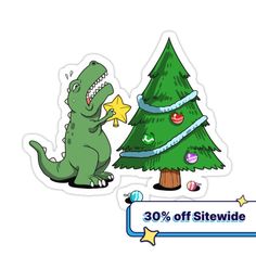 a sticker depicting a crocodile next to a christmas tree with a star on it