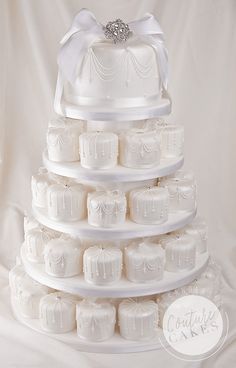 a wedding cake made out of plastic containers