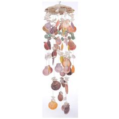 a wind chime with seashells hanging from it