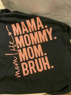 **Mom Life Shirt - "Mama, Mommy, Mom... Bruh" - Because Momming is a Full-Time Job! ️ Celebrate the wild, funny, and chaotic ride of motherhood with our *"Mama, Mommy, Mom... Bruh"* shirt! Perfect for moms who hear their name a thousand times a day and still keep their cool. This shirt is a fun and relatable way to show off your #MomLife in style! **Features - Soft, comfortable fabric made for busy moms on the go - Playful "Mama, Mommy, Mom... Bruh" graphic that captures the essence of motherhood - Available in adult unisex sizes  - Great for casual wear, playdates, or as a gift for moms who do it all **Materials - 100% cotton  - Lightweight and breathable for everyday comfort **Care Instructions - Machine washable, tumble dry low - Wash inside out to preserve the graphic **Shipping Info - Ma Mama Mom Bruh, Mommy Mom Bruh, Mom Bruh Shirt, Mom Mommy Bruh Shirt, Mom Mommy Bruh Svg, Motherhood Funny, Full Time Job, Mom Life Shirt, Busy Mom