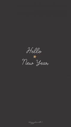 a black and white photo with the words hello new year written in gold on it