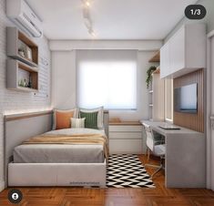 a small bedroom with a bed, desk and television