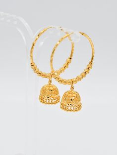 This 22ct Gold Ball Jhumki Bali weighs 11.05 grams and is crafted with precision and quality. Featuring a shiny and elegant design, these earrings are the perfect addition to any outfit, adding a touch of sophistication and luxury. Purity: 22ct gold Width: 3.0 cm (Diameter) Elegant Design, Bali, Gold, Design